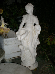Cement lady with children for fountain