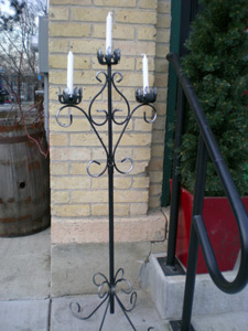 Black iron, three candle floor stand